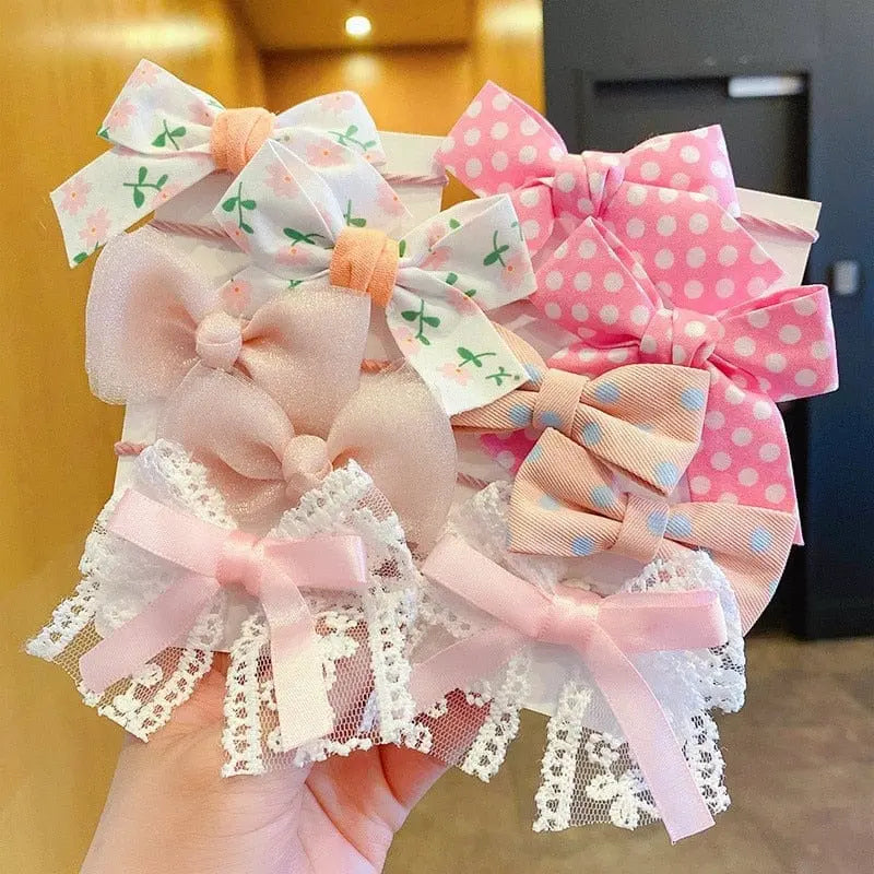 Set of 10 big bow flower elastic hairbands for girls and kids, colorful and cute hair accessories for children.