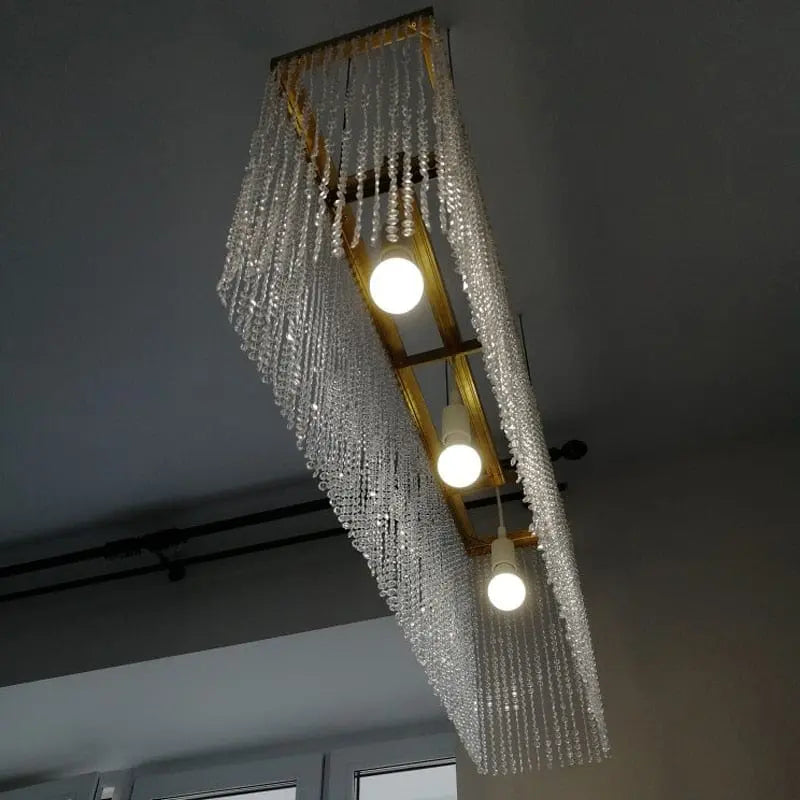 Showlu 10m transparent acrylic crystal garland for wedding and Christmas decorations, featuring elegant hanging pendants for festive decor.