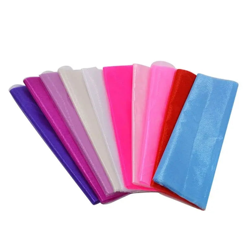 YONGSNOW 10m sheer crystal organza tulle roll in 48cm width for wedding arch decor and party decorations, shown in image.