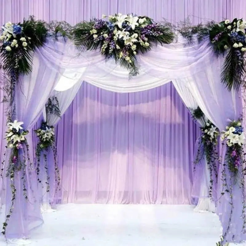 YONGSNOW 10m sheer crystal organza tulle roll for wedding arch decor, showcasing transparent, lightweight fabric for elegant event decoration.