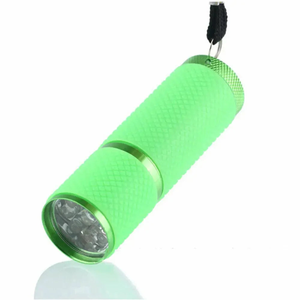 Showlu Mini UV LED Nail Lamp with 9 LEDs, portable wireless gel polish flashlight and torch for quick nail curing.