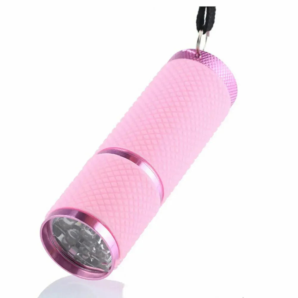 Showlu Mini UV LED Nail Lamp with 9 LEDs, portable gel polish flashlight torch, wireless design, compact nail curing device