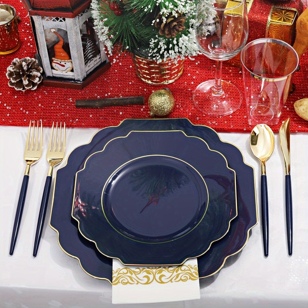 Nervure 140-piece gold plastic dinnerware set including plates, cups, forks, knives, spoons, and napkins for weddings and parties.