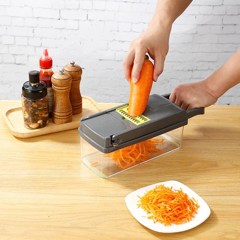 KEMORELA 16-in-1 vegetable chopper with stainless steel blades, handle, and multiple slicing and dicing attachments for kitchen prep.
