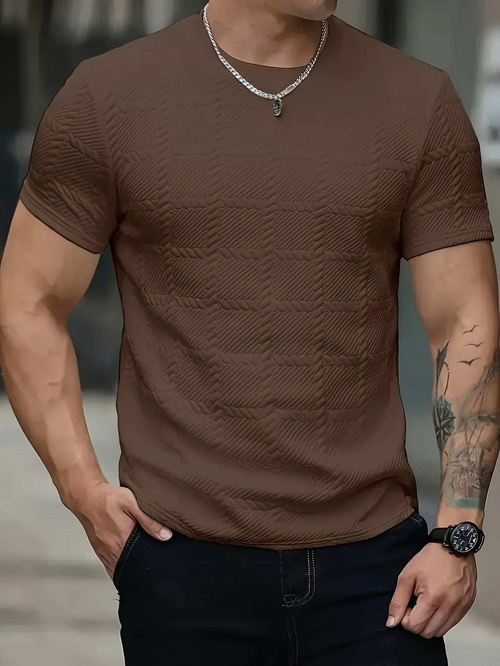 Men's SHOWLU geometric jacquard knit T-shirt with casual round neck, stylish and comfortable men's fashion top.