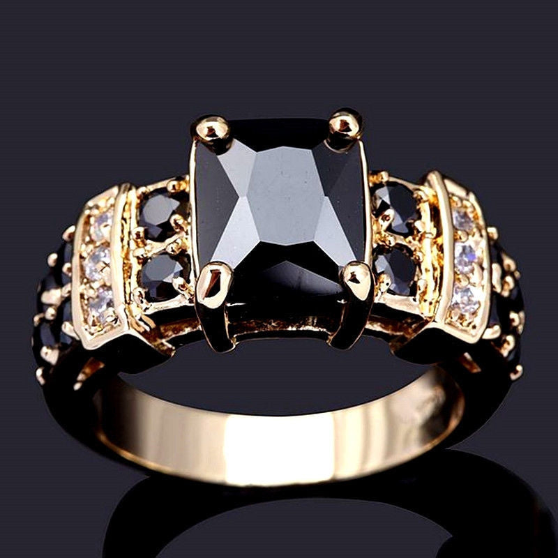Gold-plated black zircon ring for women, elegant wedding jewelry featuring a stylish design and sparkling black zircon stones.
