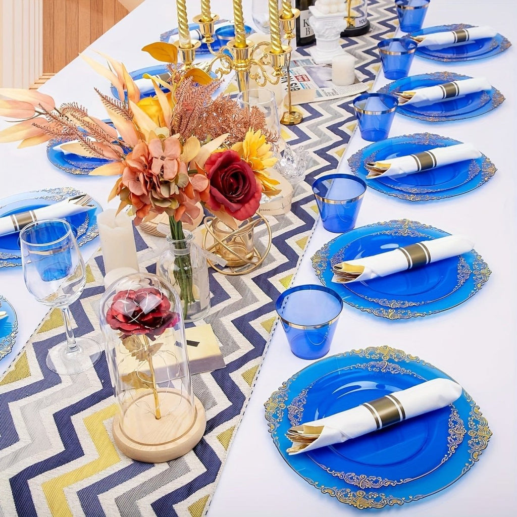 Showlu Fashion Store Nervure 175-piece disposable plastic party plates and cutlery set with black, gold, and blue dinnerware for 25 guests.