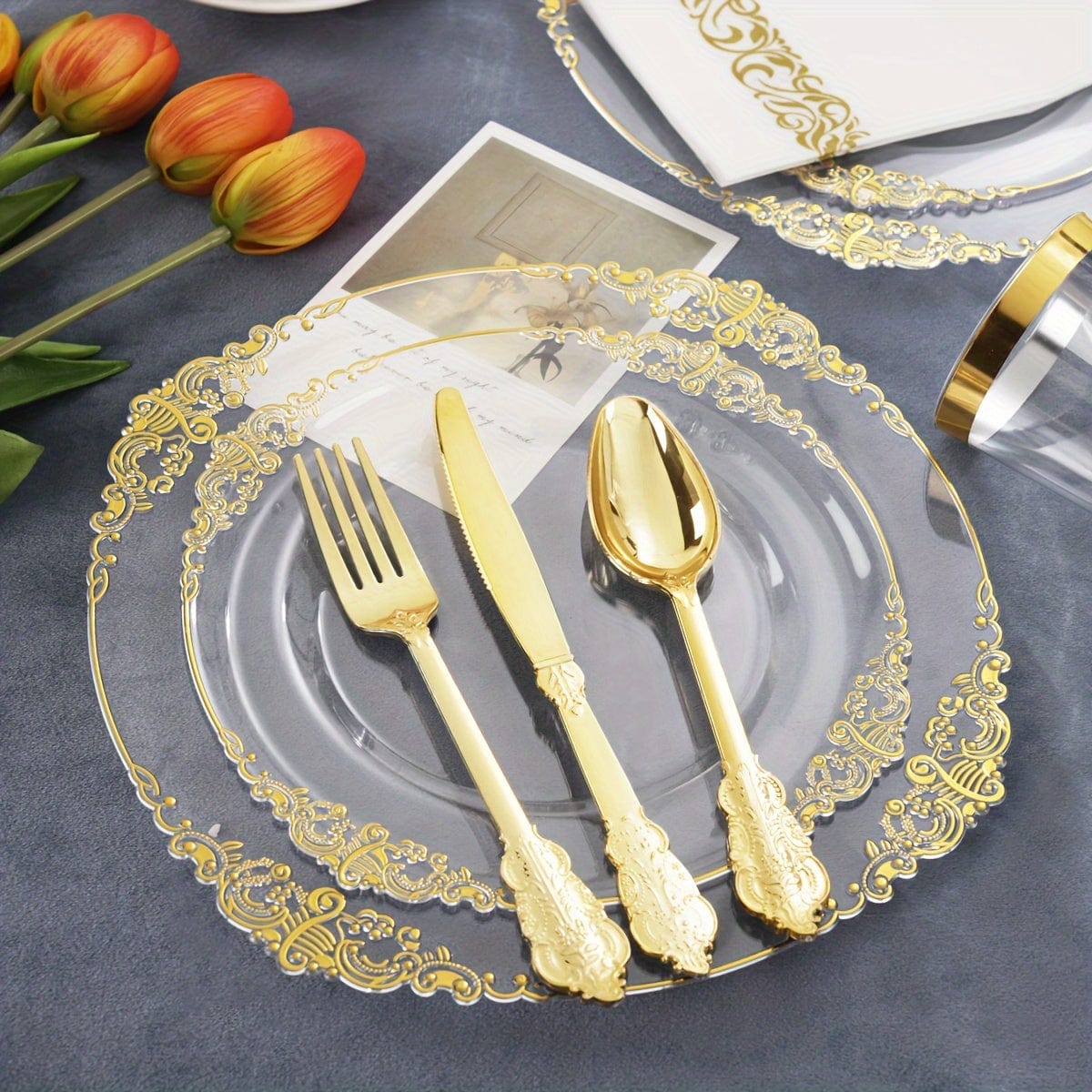 Nervure 175-piece purple and gold plastic dinnerware set including plates, cups, utensils, and napkins for 25 guests.