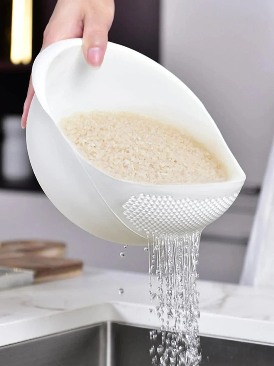 Showlu silicone rice drain basket with handle, used for washing and draining rice, fruits, and vegetables in kitchen.