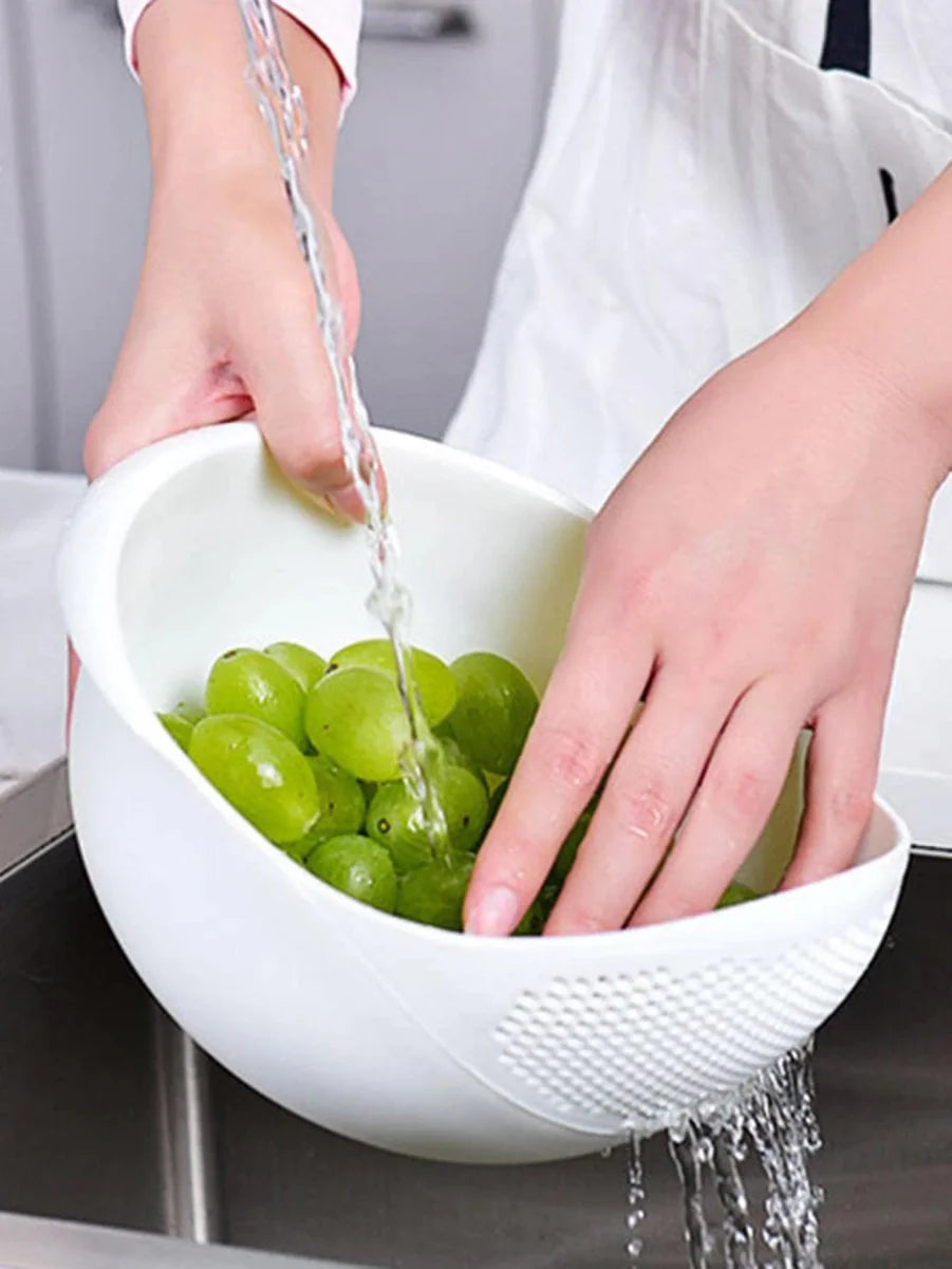 Showlu silicone rice drain basket with handle, used as a kitchen fruit washing colander and bowl for draining and rinsing food.