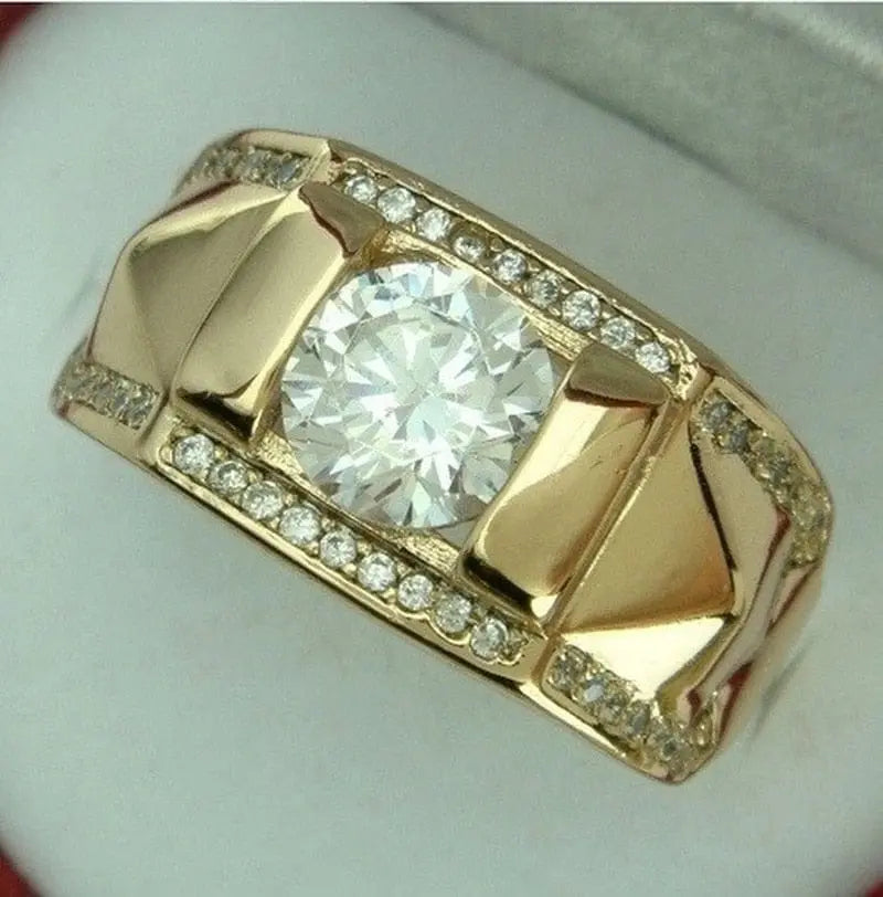 Gold zircon inlaid wedding band for women, luxury metal ring with intricate carving and sparkling stones, ideal for bridal jewelry.
