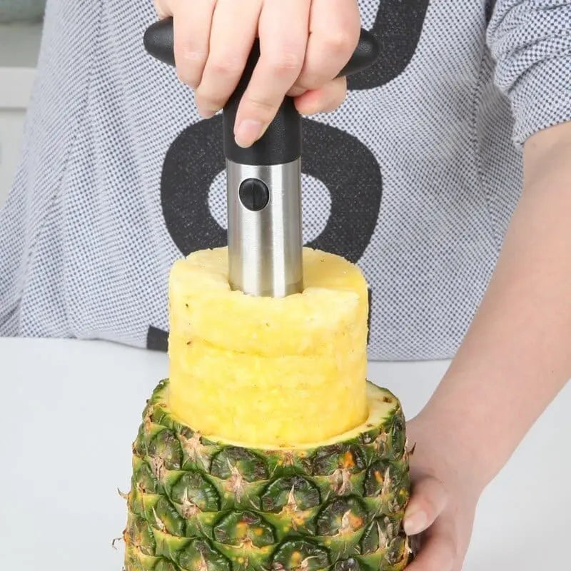 Showlu stainless steel pineapple slicer and peeler kitchen tool for easy fruit preparation and slicing.