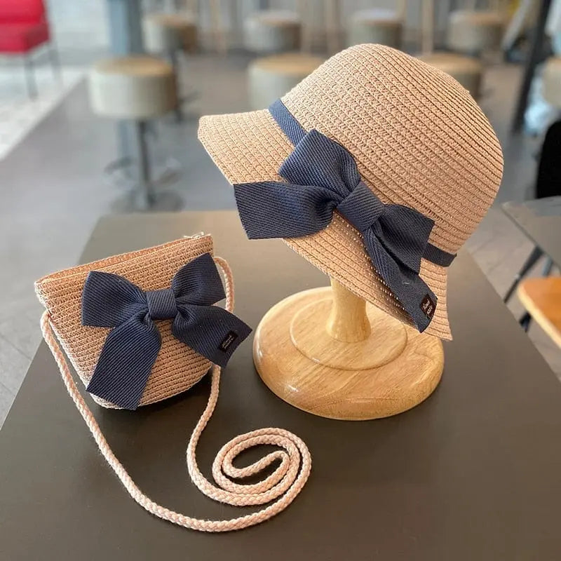 Showlu Kids straw sun hat and floral bag set for girls, perfect for summer beach trips and sun protection.