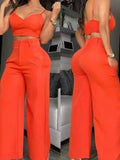 SHOWLU Women's 2-piece set with white V-neck cami crop top and hollow-out wide-leg high-waist pants, casual fashion outfit.