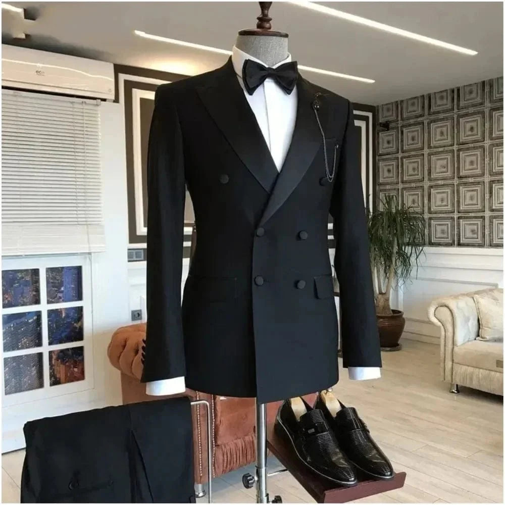 Showlu men's black double-breasted wedding tuxedo with peaked lapel, featuring tailored jacket and matching pants for formal occasions.