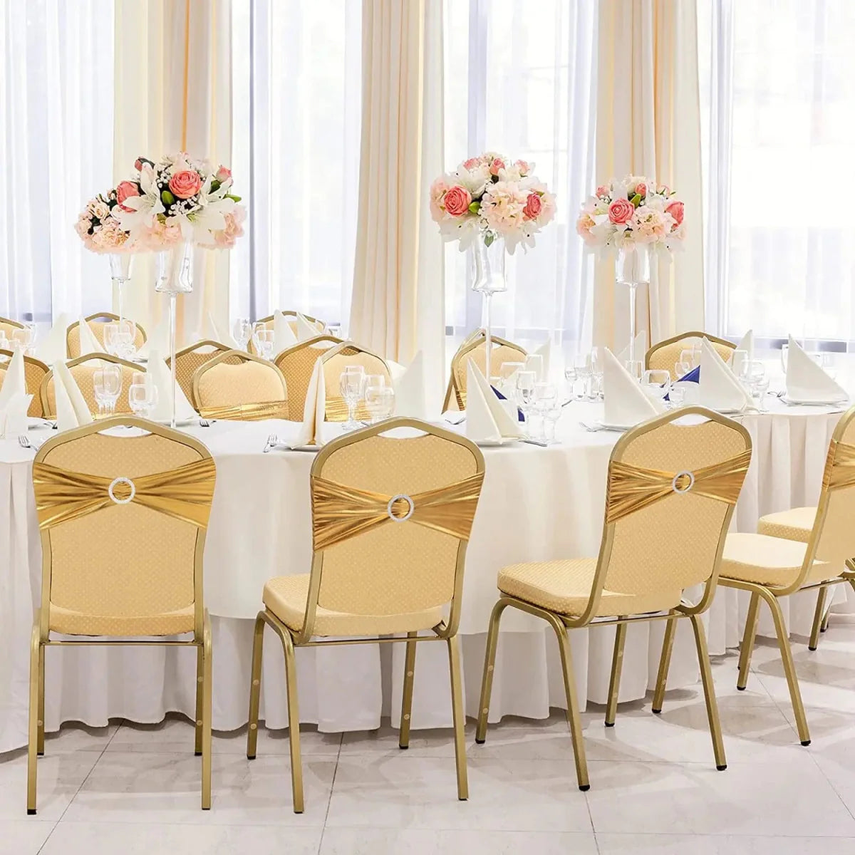 Set of 20 metallic gold spandex chair sashes with buckles, perfect for wedding and event chair decorations.