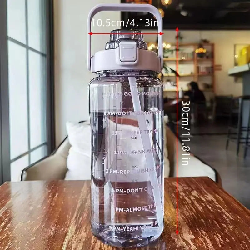 Showlu 2000ml large capacity sports water bottle with plastic straw, ideal for camping and outdoor activities.