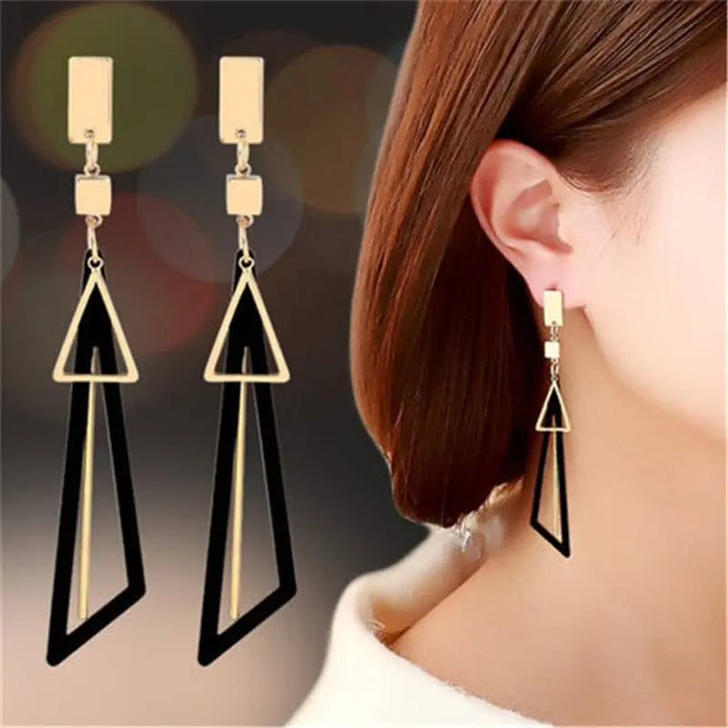 Showlu Korean geometric triangle tassel dangle earrings for women with long statement design and stylish jewelry detail.