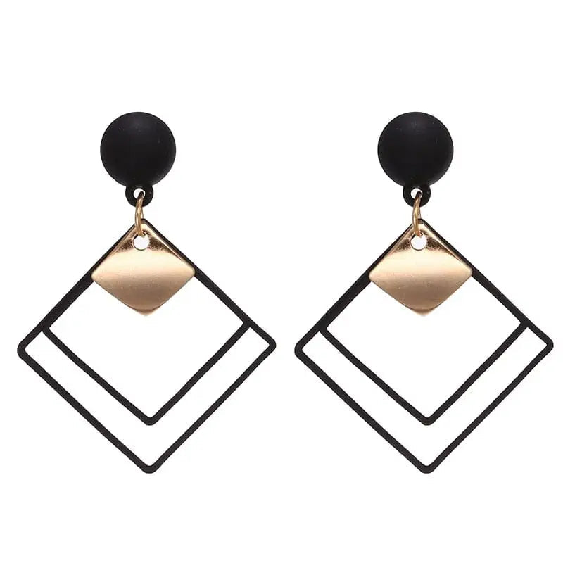 Showlu Korean geometric triangle tassel dangle earrings for women, featuring long statement design with vibrant colors and intricate details.