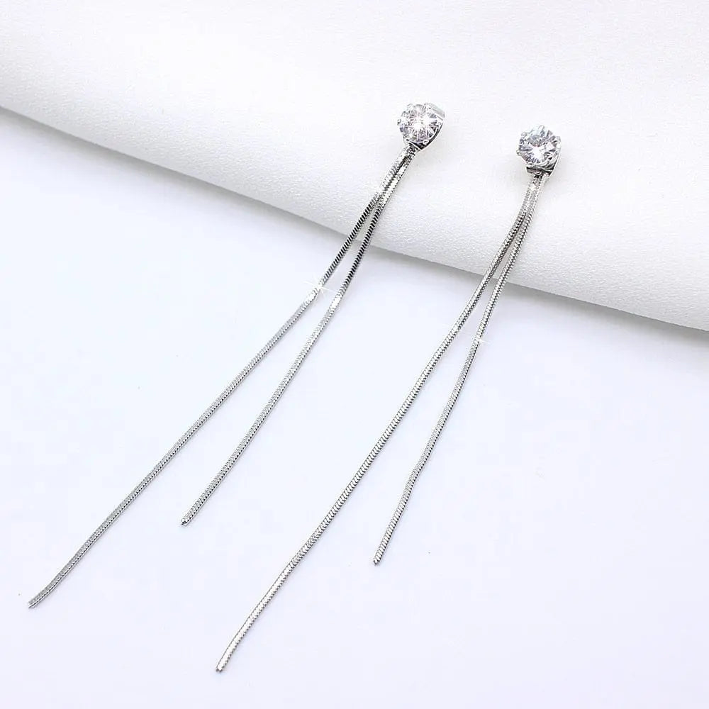 Showlu Korean geometric triangle tassel dangle earrings for women with long statement design and modern jewelry style.