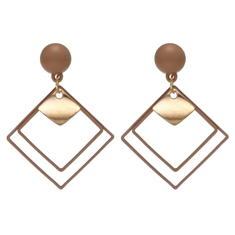 Showlu Korean geometric triangle tassel drop earrings for women featuring long dangle design with stylish jewelry details.