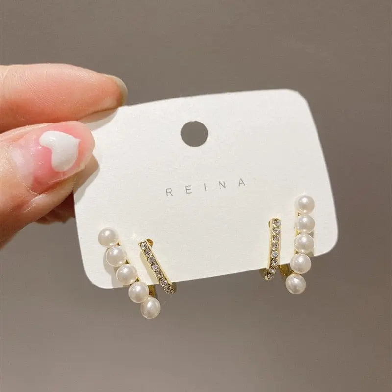Showlu Korean geometric triangle tassel dangle earrings for women with long statement design and drop style jewelry.
