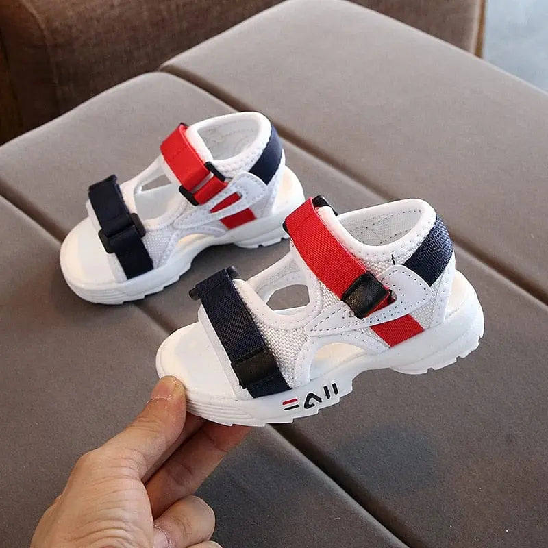 Unisex toddler gladiator sandals by Showlu Store Nation, soft leather, non-slip soles, ideal for summer beach and outdoor play.