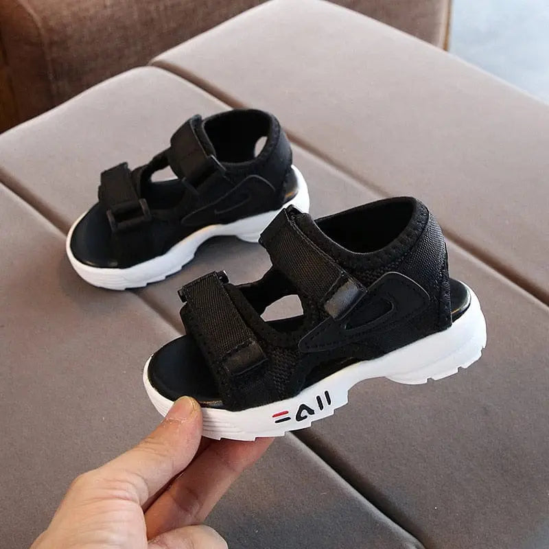 Toddler unisex gladiator sandals by Showlu Store Nation, soft leather, non-slip soles, perfect for summer beach and outdoor play.