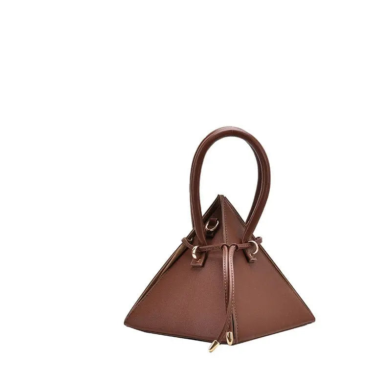 Chonghui women's triangle chain bucket bag made of PU leather, crossbody style with chain strap and stylish design.
