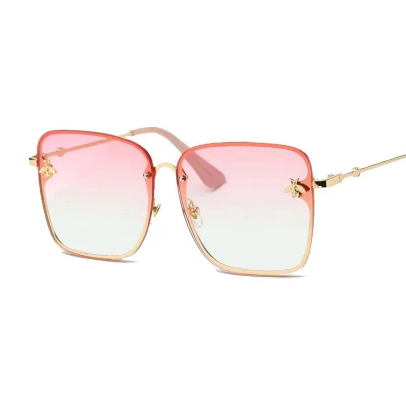 Square fashion sunglasses with UV400 mirror lenses and alloy frames, worn by a woman in a luxury designer style.