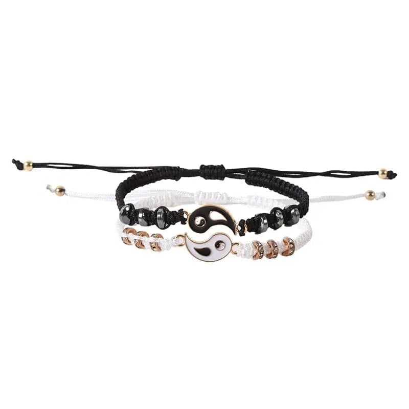 Matching Yin Yang friendship bracelets with adjustable cords, showcasing the black and white design for best friends or couples.