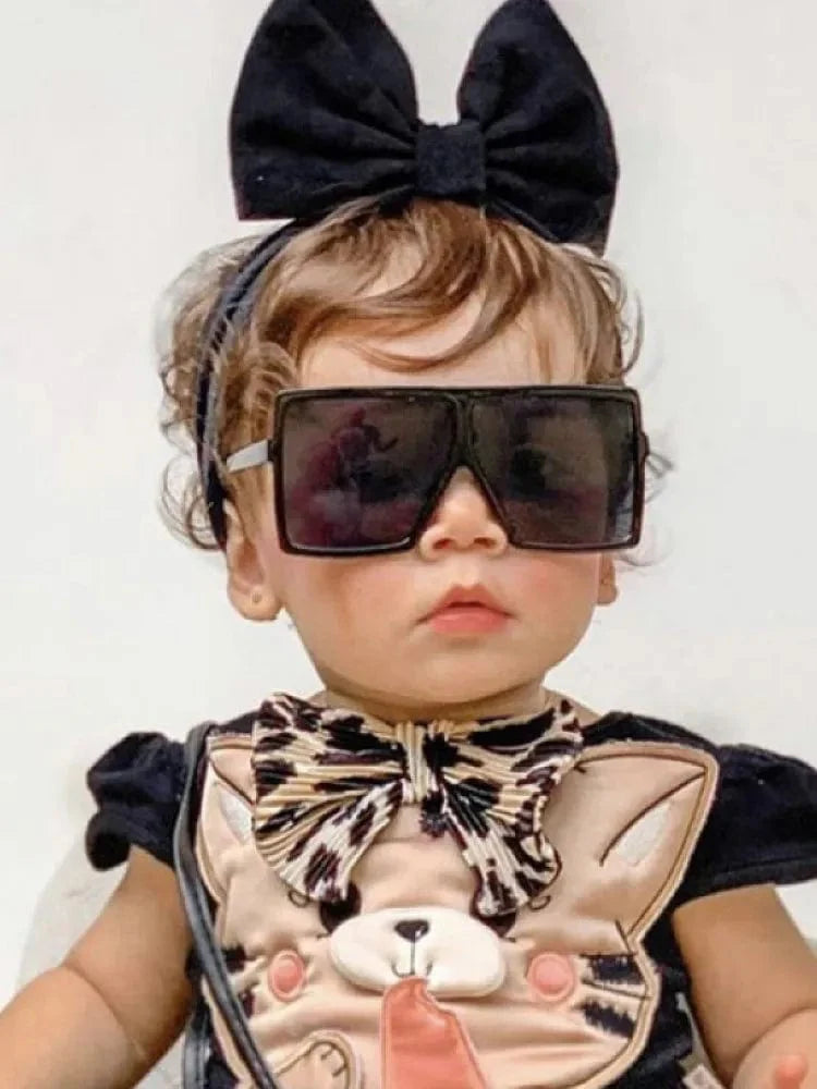 Heevoo Kids square sunglasses with UV400 mirror lenses for boys and girls, stylish children's eyewear from Showlu Fashion Store.