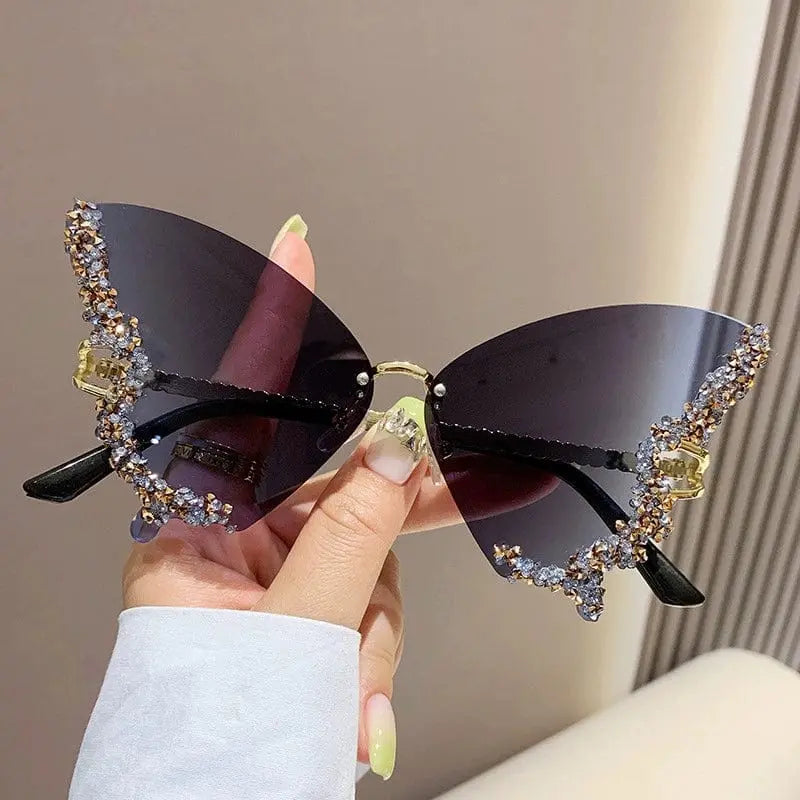 Elegant diamond butterfly sunglasses by Showlu Fashion with square frames, UV-proof lenses, perfect for fashionable street style.