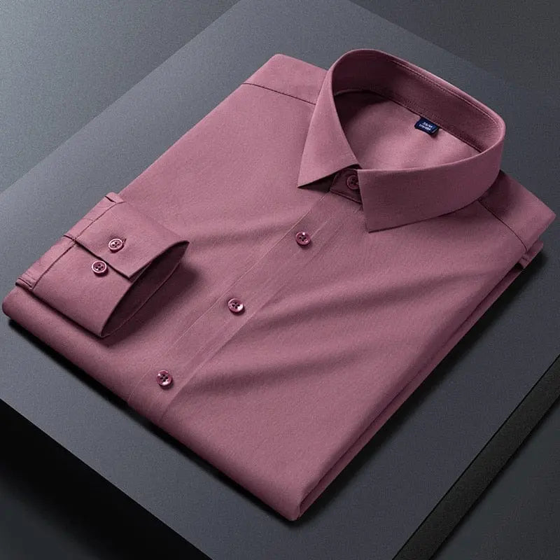 Slim fit white men's dress shirt by Showlu Fashion Store, featuring stretch fabric and anti-wrinkle long sleeves for business wear.