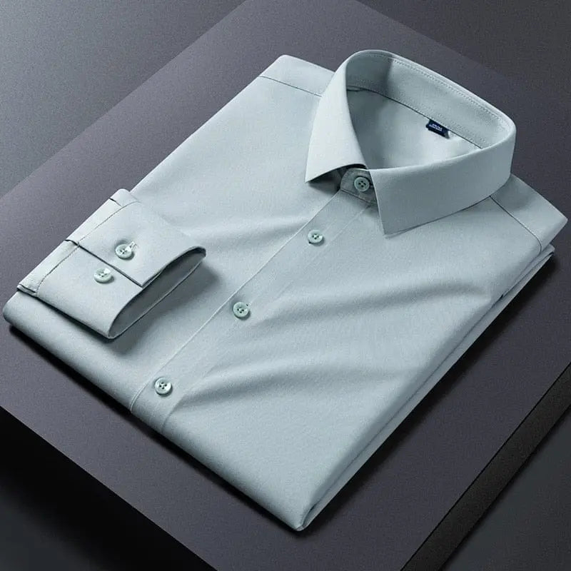 White men's slim fit stretch dress shirt with anti-wrinkle fabric, long sleeves, ideal for business or social occasions.