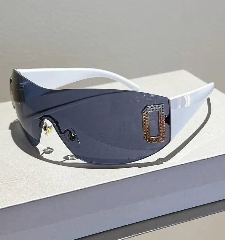 Showlu Fashion Women's frameless large square sunglasses with UV400 protective PC lenses, stylish and casual for sunny days.