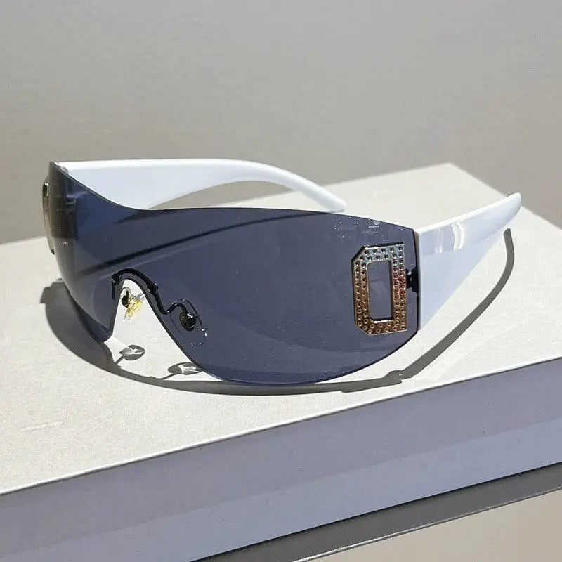Stylish women's frameless large square sunglasses with UV400 protection and clear PC lenses, perfect for casual sunny days.