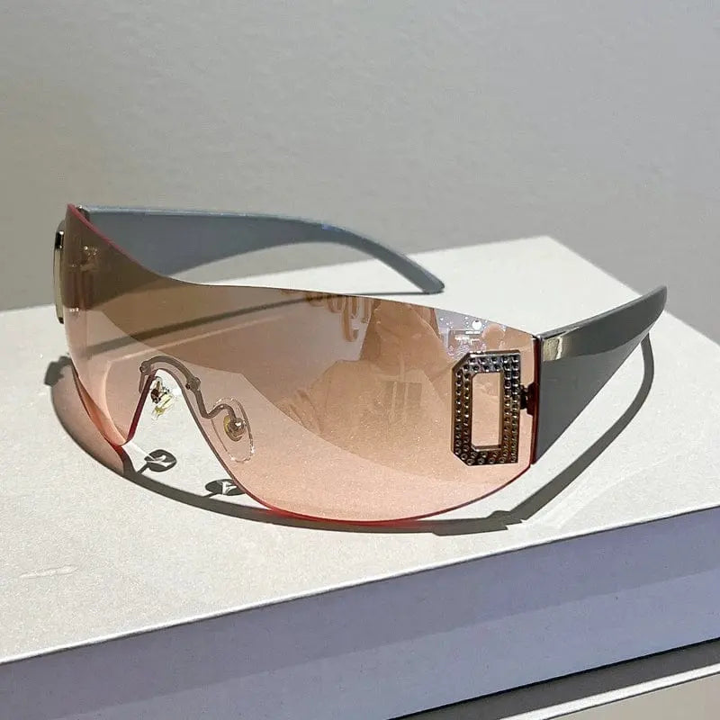 Women's frameless large square sunglasses with UV400 protection, stylish PC lenses and a modern fashion-forward design.