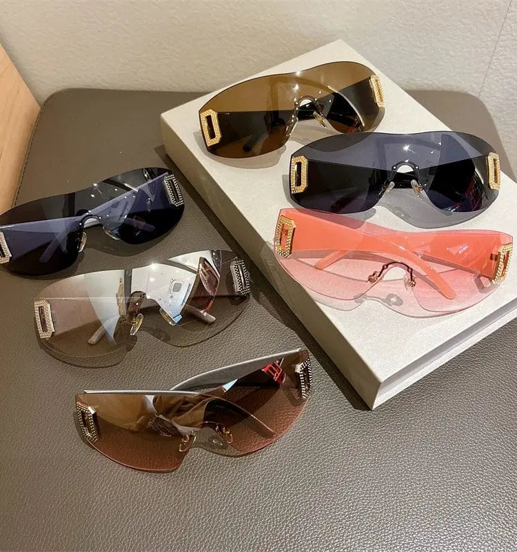 Stylish women's frameless large square sunglasses with UV400 PC lenses, showcasing a modern, fashionable design for sun protection.