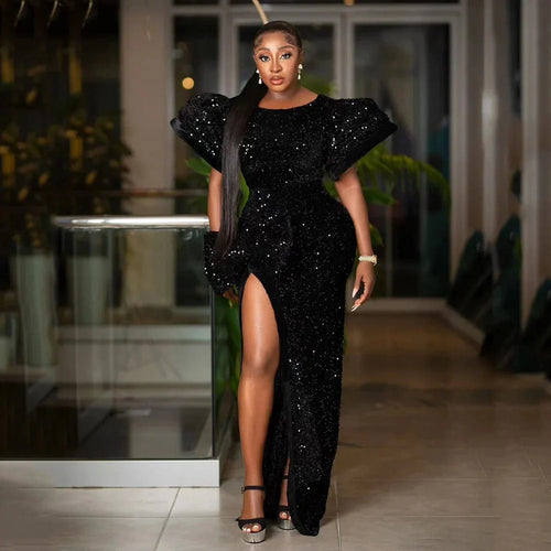 Black sequin evening dress by SHOWLU FASHION STORE featuring puffed sleeves, high slit, round neck, and fishtail floor-length design.