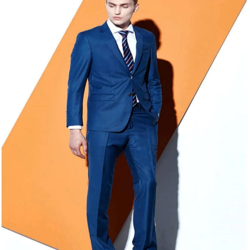 Burgundy red slim fit 2-piece men's suit by SHOWLU FASHION STORE, featuring a tailored tuxedo jacket and matching pants for formal occasions.