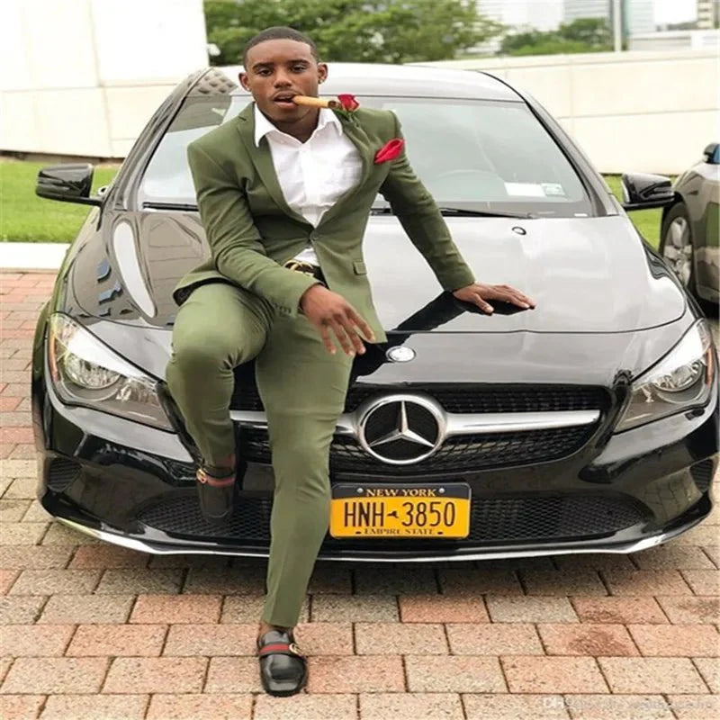 Burgundy red slim fit men's tuxedo suit with matching pants, tailored cotton jacket, ideal for formal occasions and weddings.