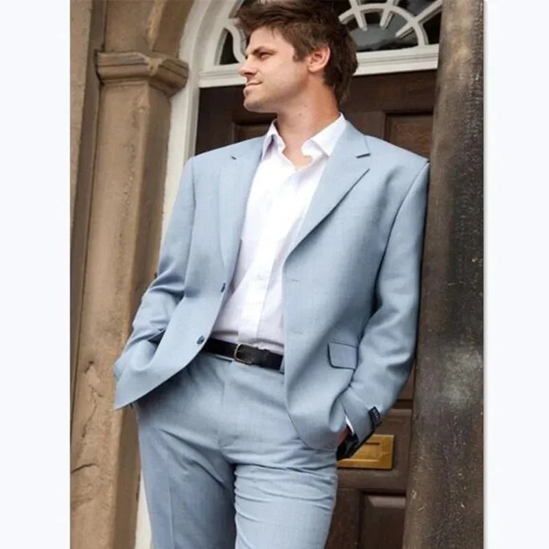 Burgundy red slim fit men's tuxedo suit with jacket and pants, stylish cotton formal 2-piece for weddings and special occasions.