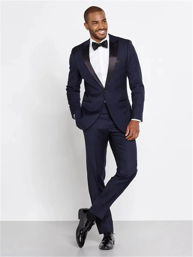 Burgundy red slim fit men's tuxedo suit by SHOWLU FASHION STORE, includes tailored jacket and matching pants for formal occasions.