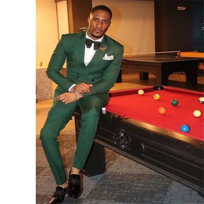 Burgundy red men's slim fit 2-piece suit with tuxedo jacket and pants, stylish formalwear for weddings and special occasions.