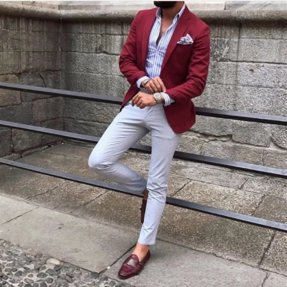 Burgundy red slim fit men's suit by SHOWLU FASHION STORE, includes tuxedo jacket and pants, perfect for formal occasions and weddings.