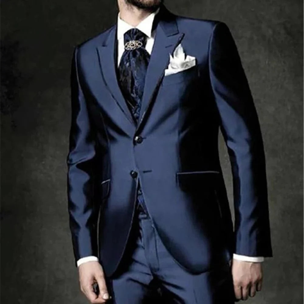 Showlu navy blue peak lapel 3-piece groom tuxedo with slim fit jacket, vest, and pants for wedding or formal occasions.