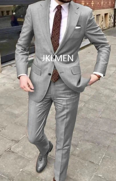 Men's skinny fit 2-piece suit by SHOWLU FASHION STORE, featuring a cotton tuxedo with notched lapel for business or wedding wear.