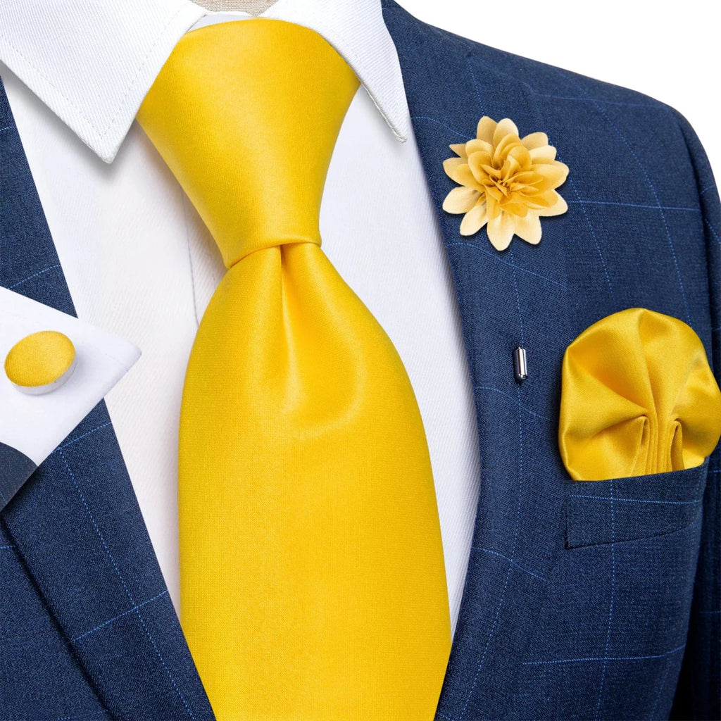 Yellow plaid silk tie set for men featuring cufflinks, brooch pin, and handkerchief, ideal for weddings and formal occasions.