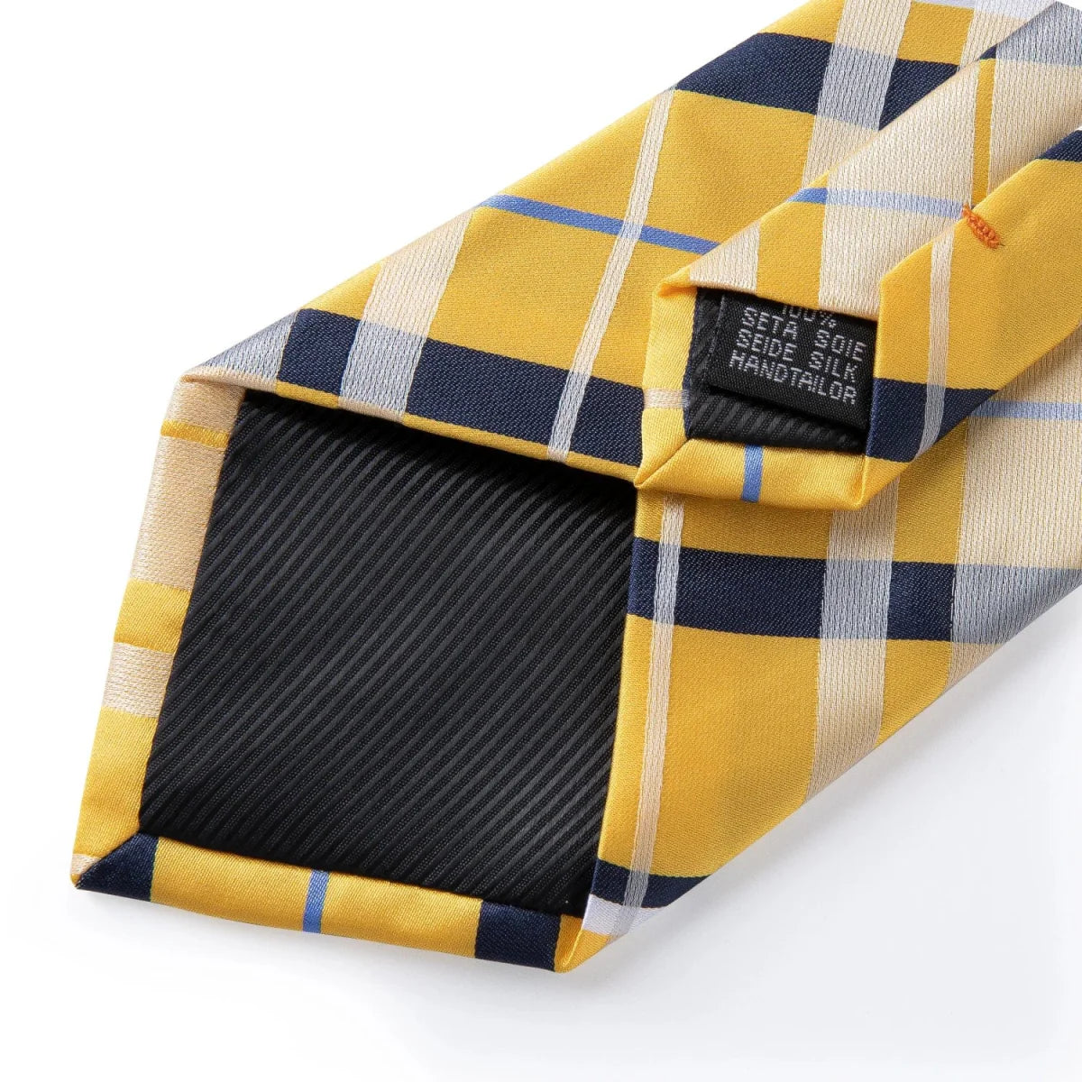 Men's yellow plaid silk tie set with matching cufflinks, brooch pin, and handkerchief, perfect for weddings and formal occasions.